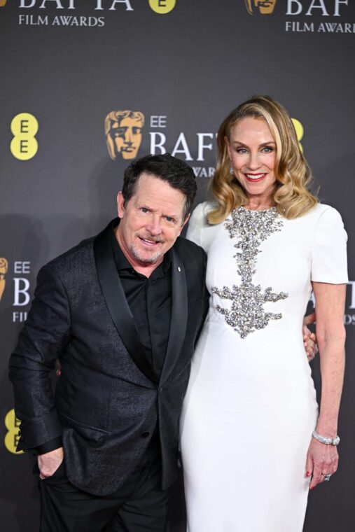 Michael J Fox and Tracy Pollan at the EE BAFTA Film Awards at The Royal Festival Hall in London, England, on February 18, 2024. | Source: Getty Images