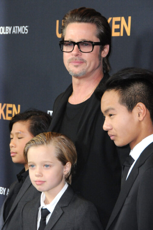 Pax Thien Jolie-Pitt, Shiloh Nouve Jolie-Pitt, Brad Pitt, and Maddox Jolie-Pitt at the premiere of "Unbroken" on December 15, 2014, in Hollywood, California | Source: Getty Images