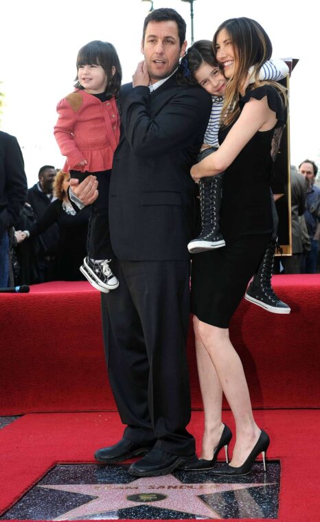 Adam Sandler with Jackie Sandler, Sunny Sandler, and Sadie Sandler in Hollywood, California, on February 1, 2011. | Source: Getty Images