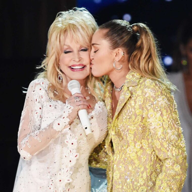 Dolly Parton and Miley Cyrus perform on stage during the 61st Annual Grammy Awards in Los Angeles, California on February 10, 2019. | Source: Getty Images