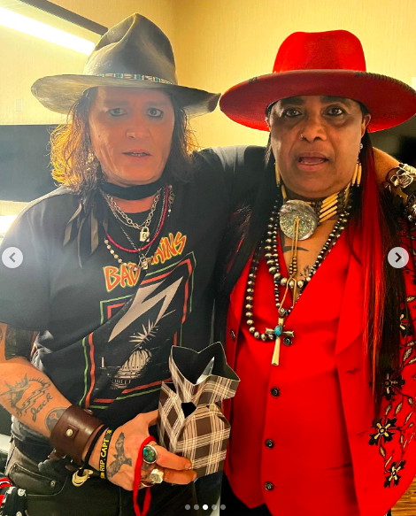 Johnny Depp and Micki Free posing for a picture posted on November 5, 2022 | Source: Getty Images