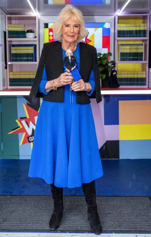 Queen Camilla and her Barbie doll at the International Women's Day celebration that marked the end of the Women of the World (WOW) Girls Festival Bus tour at Buckingham Palace, central London, on March 12, 2024