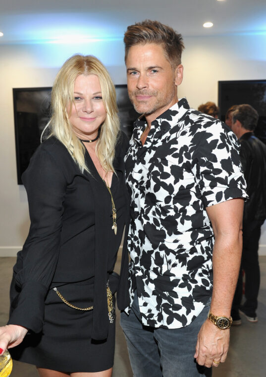 Sheryl Berkoff and Rob Lowe at the private opening of Sascha von Bismarck's debut photography collection, 