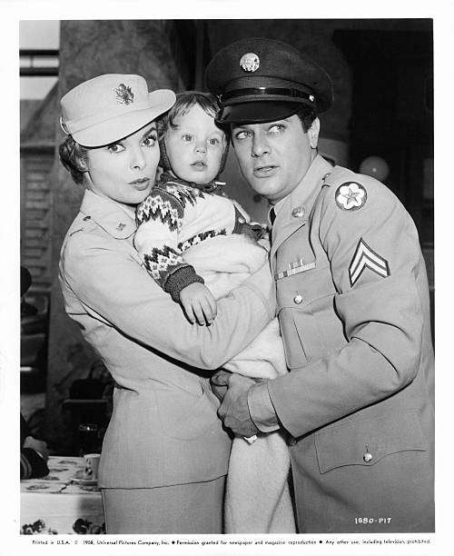 Janet Leigh and Tony Curtis posing with child in publicity portrait for the film 'The Perfect Furlough', circa 1958 | Source: Getty Images