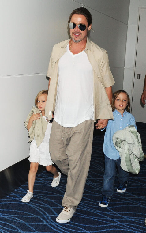 Brad Pitt, Knox Jolie-Pitt and Vivienne Jolie-Pitt on July 30, 2013 in Tokyo, Japan | Source: Getty Images