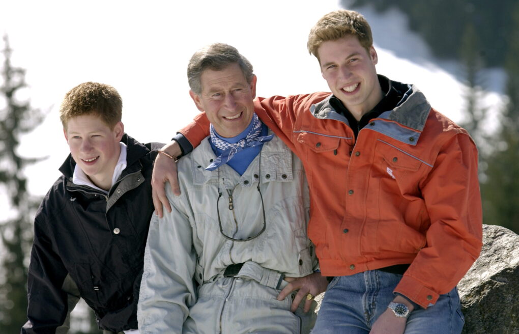 Prince Harry, King Charles III and Prince William during their annual skiing holiday in Klosters, Switzerland on March 29, 2002 | Source: Getty Images