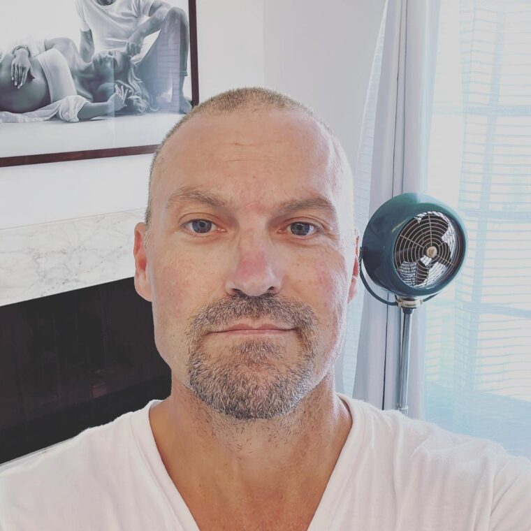 Brian Austin Green with a newly bald look and beard.