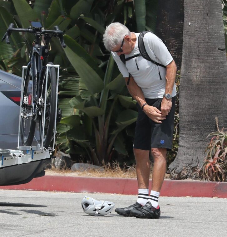 Harrison Ford, the actor and athlete, takes a break from a bike ride.